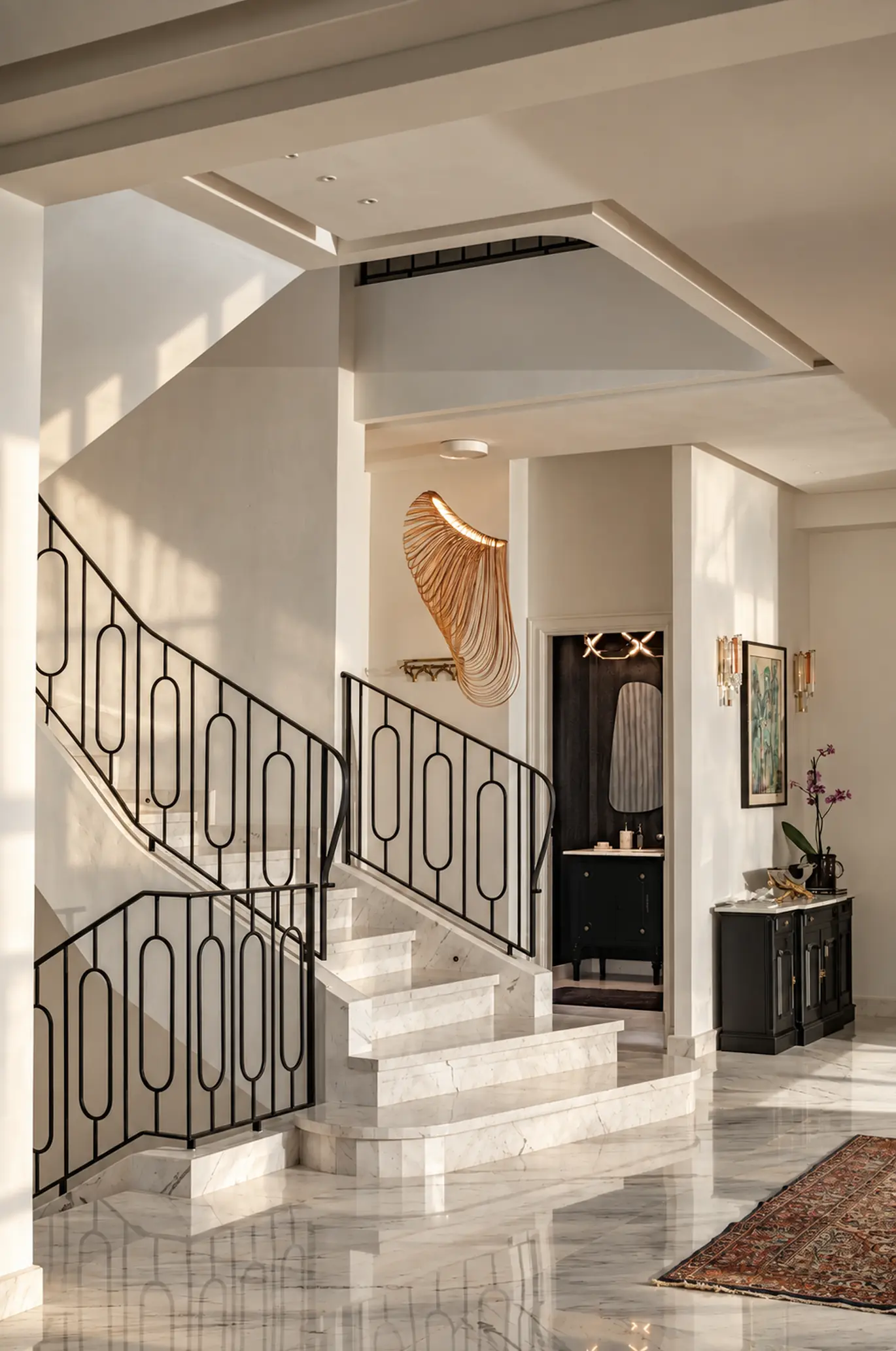 Escalier sculptural en fer forgé, résidence privée, savoir-faire BAIA
